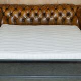 Vintage Chesterfield leather sofa bed, fully restored, circa 1940.
