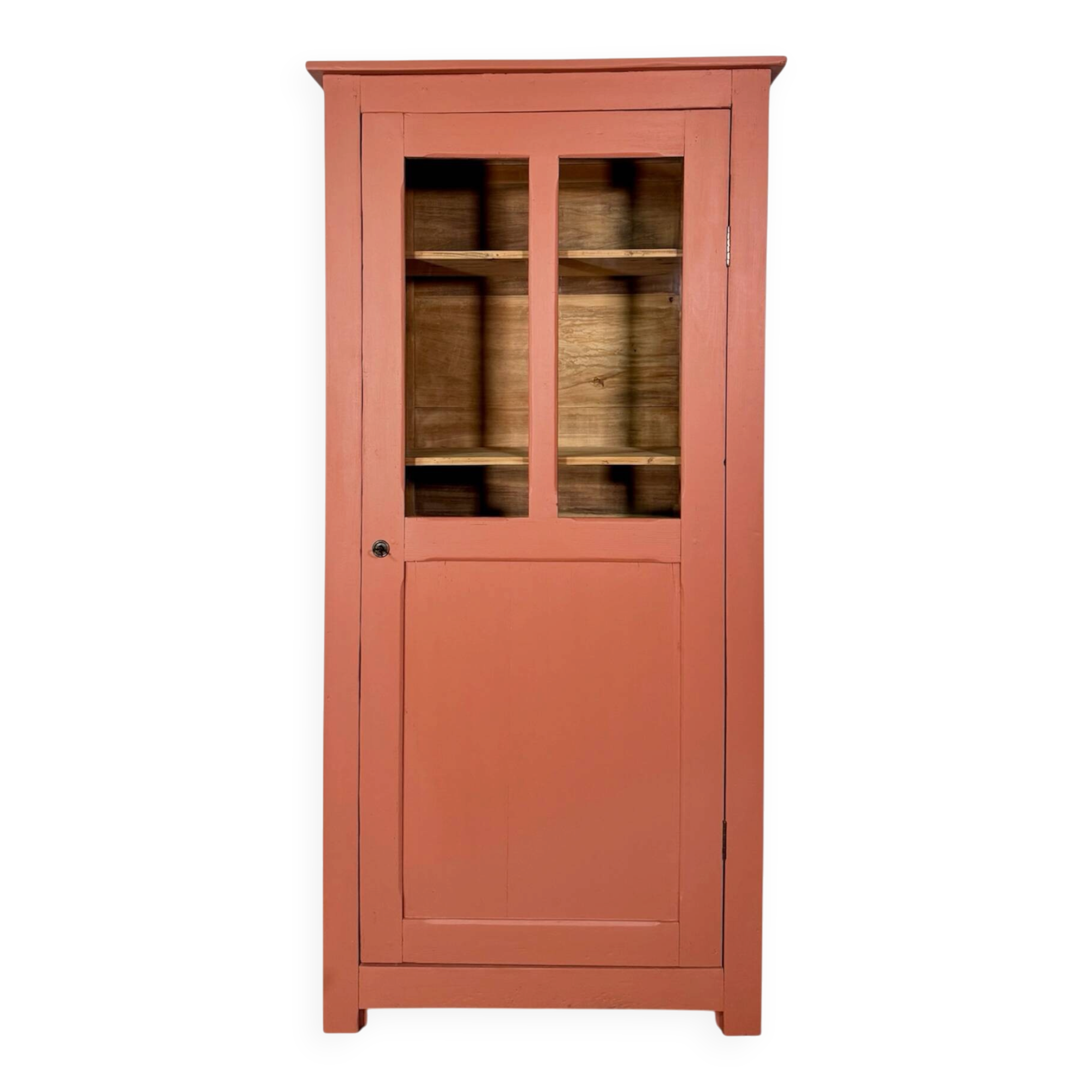 Antique glass-fronted terracotta cupboard