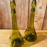 Duo of Italian decanter in green glass.