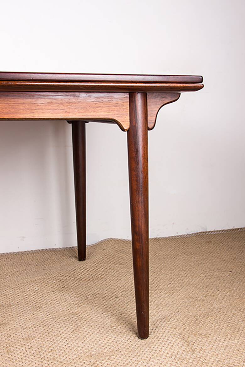 Danish extendable dining table in rosewood, model 54 by Gunni Omann