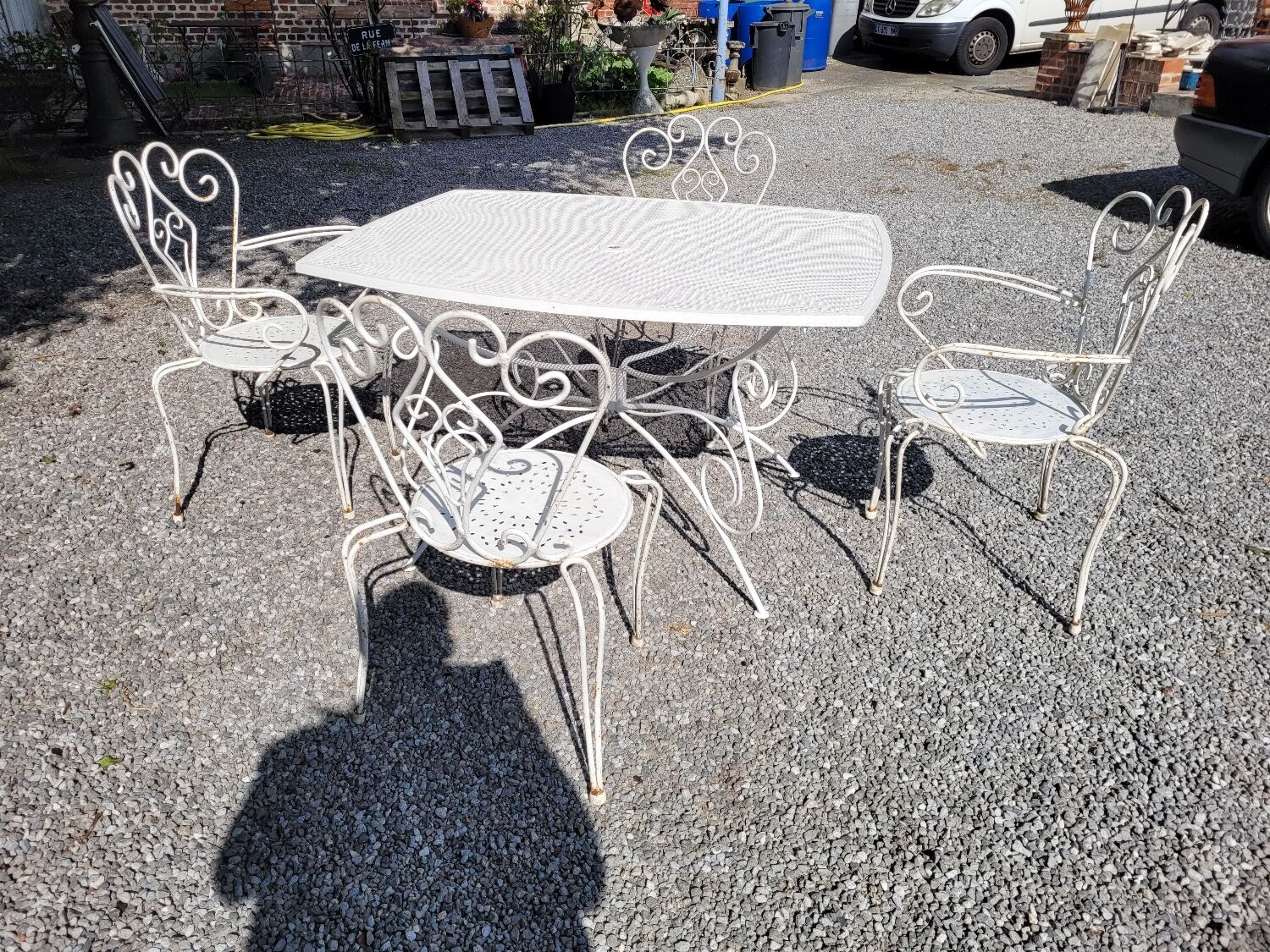 Old wrought iron garden furniture, table + 2 armchairs + 2 chairs