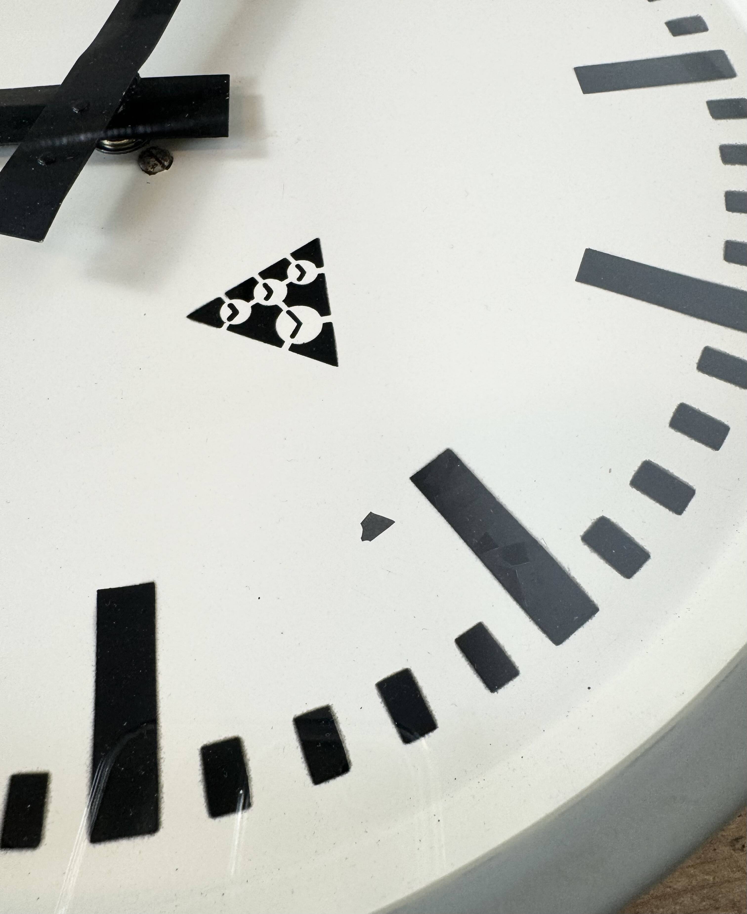 Industrial grey factory wall clock from pragotron, 1960s