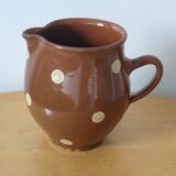 Stoneware pitcher.