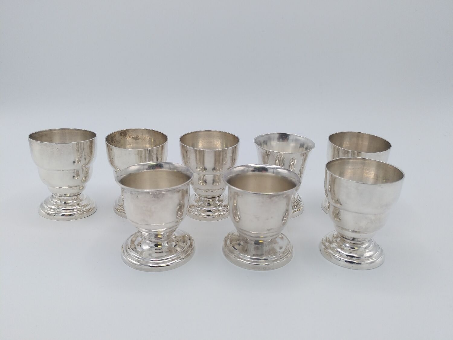 8 art deco eggcups in silver metal