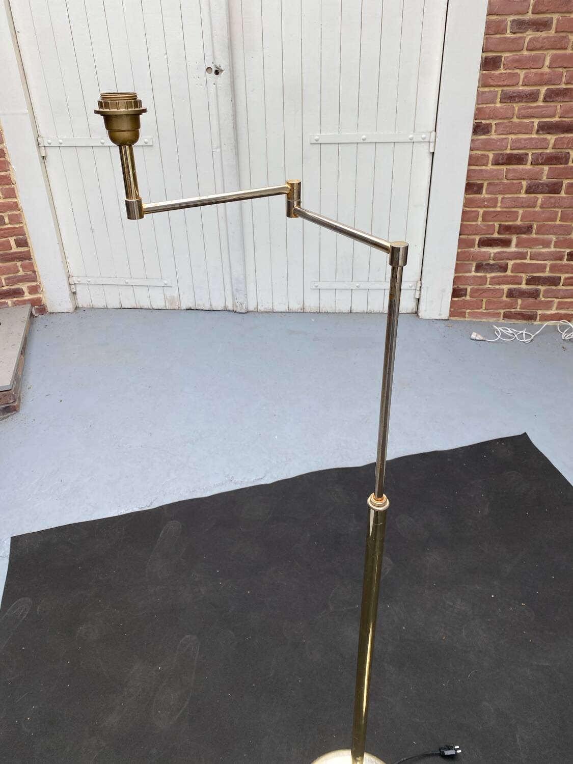 Pair of articulated floor lamps