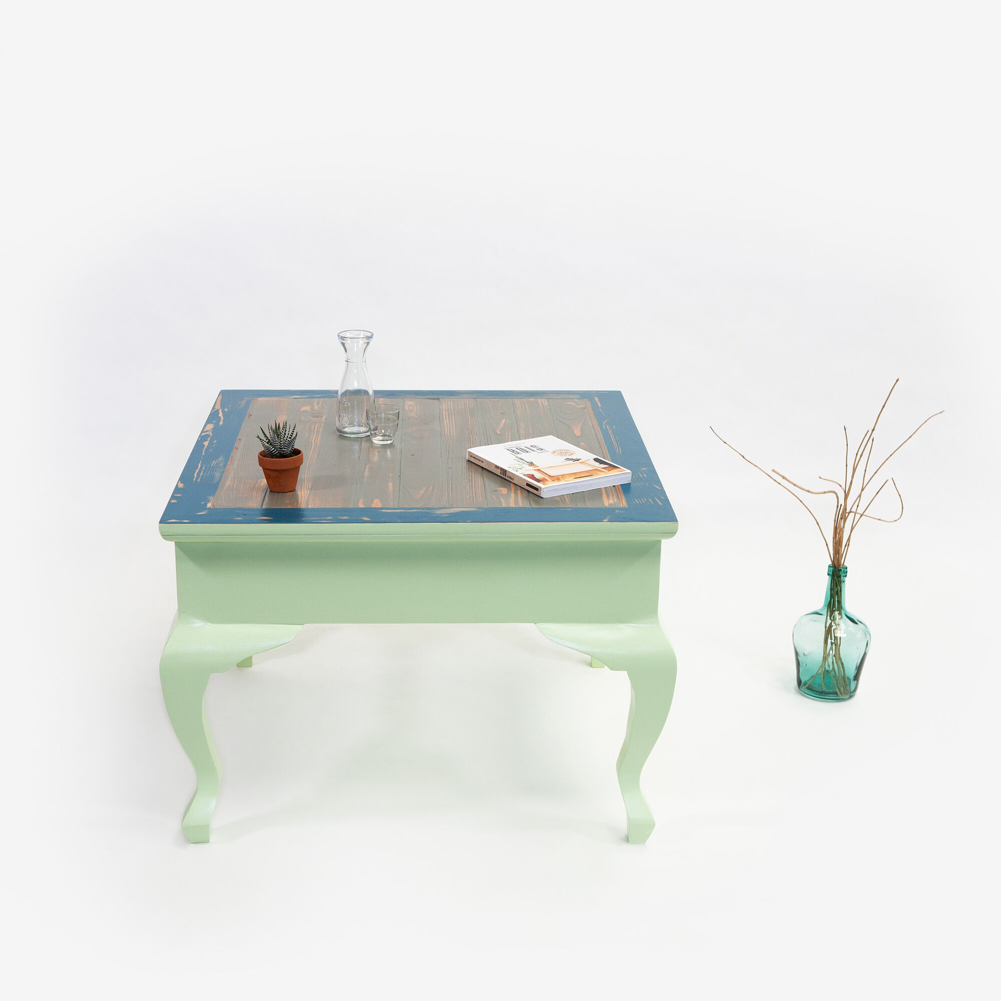 Square solid wood coffee table with curved legs