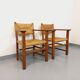 Suite de 2 fauteuils brutalistes vintage en bois de chêne et paille