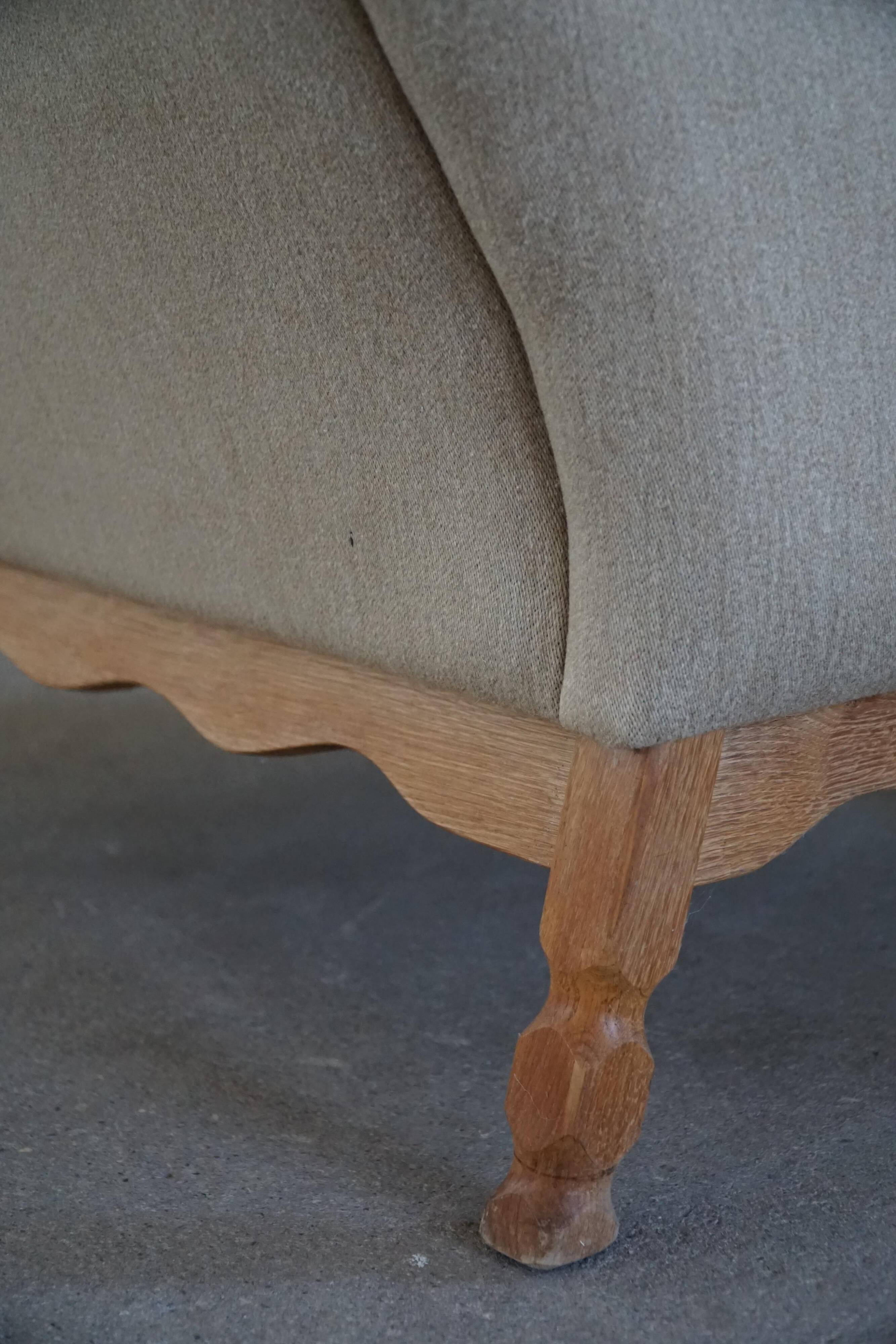 Pair of high-back lounge chairs in modern Danish style in the manner of Henning Kjærnulf, 1960s.