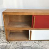 Storage cabinet with sliding doors circa 1950
