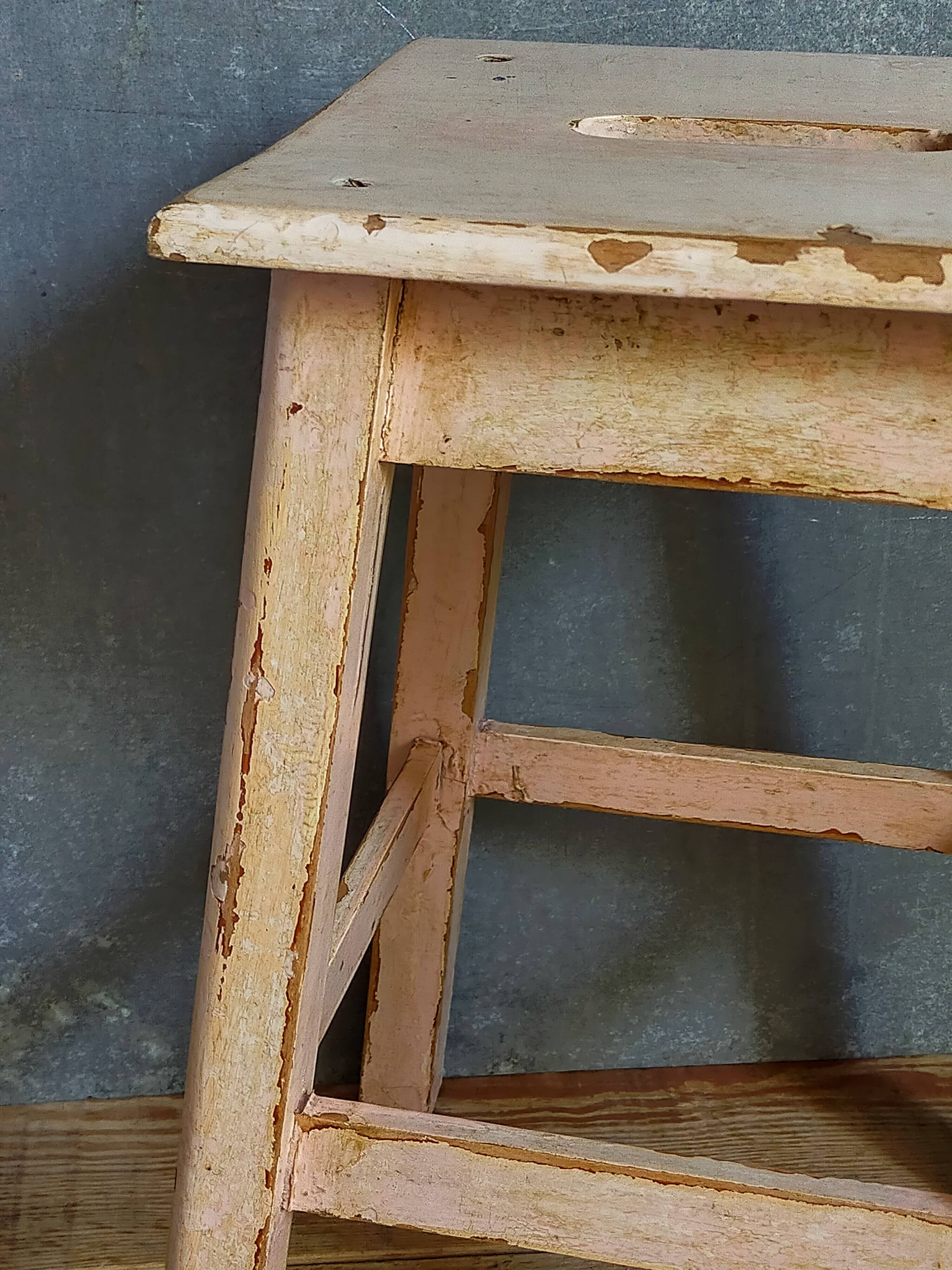 Antique workshop stool in patinated solid wood