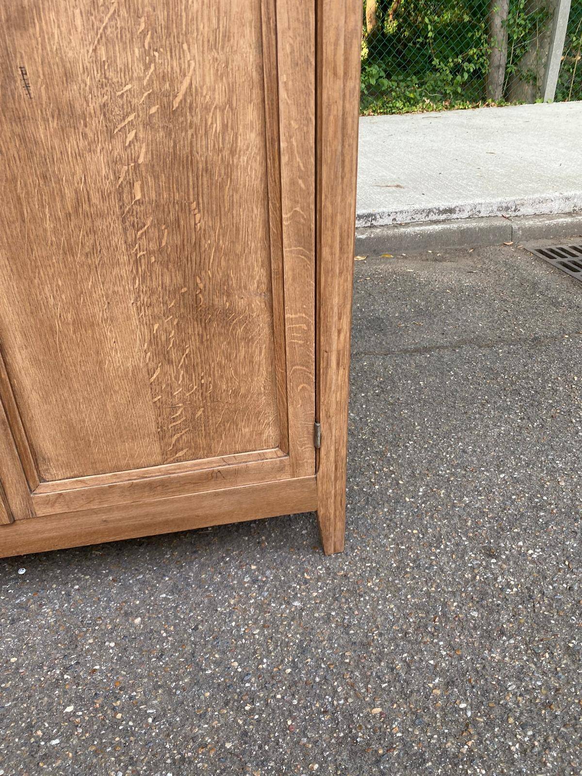 Parisian bonnetière cabinet, stripped display in solid oak from the 1930s.