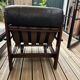 Vintage Scandinavian armchairs in leather and solid wood.