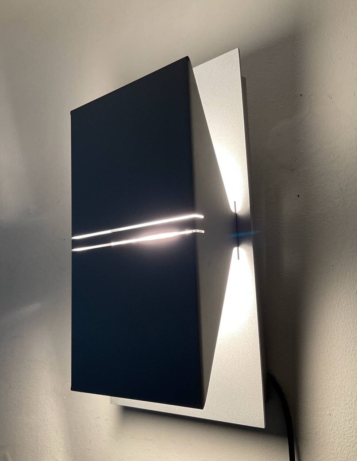 Pair of designer wall lights from the 80s-90s