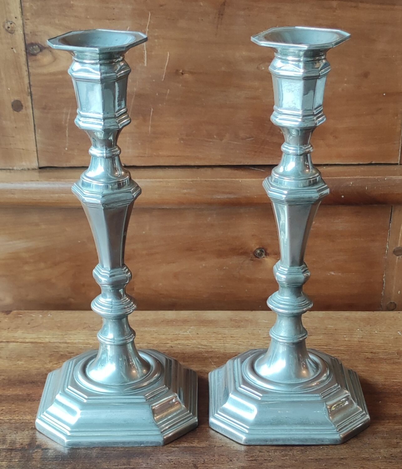Pair of old silver metal candlesticks