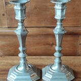 Pair of old silver metal candlesticks