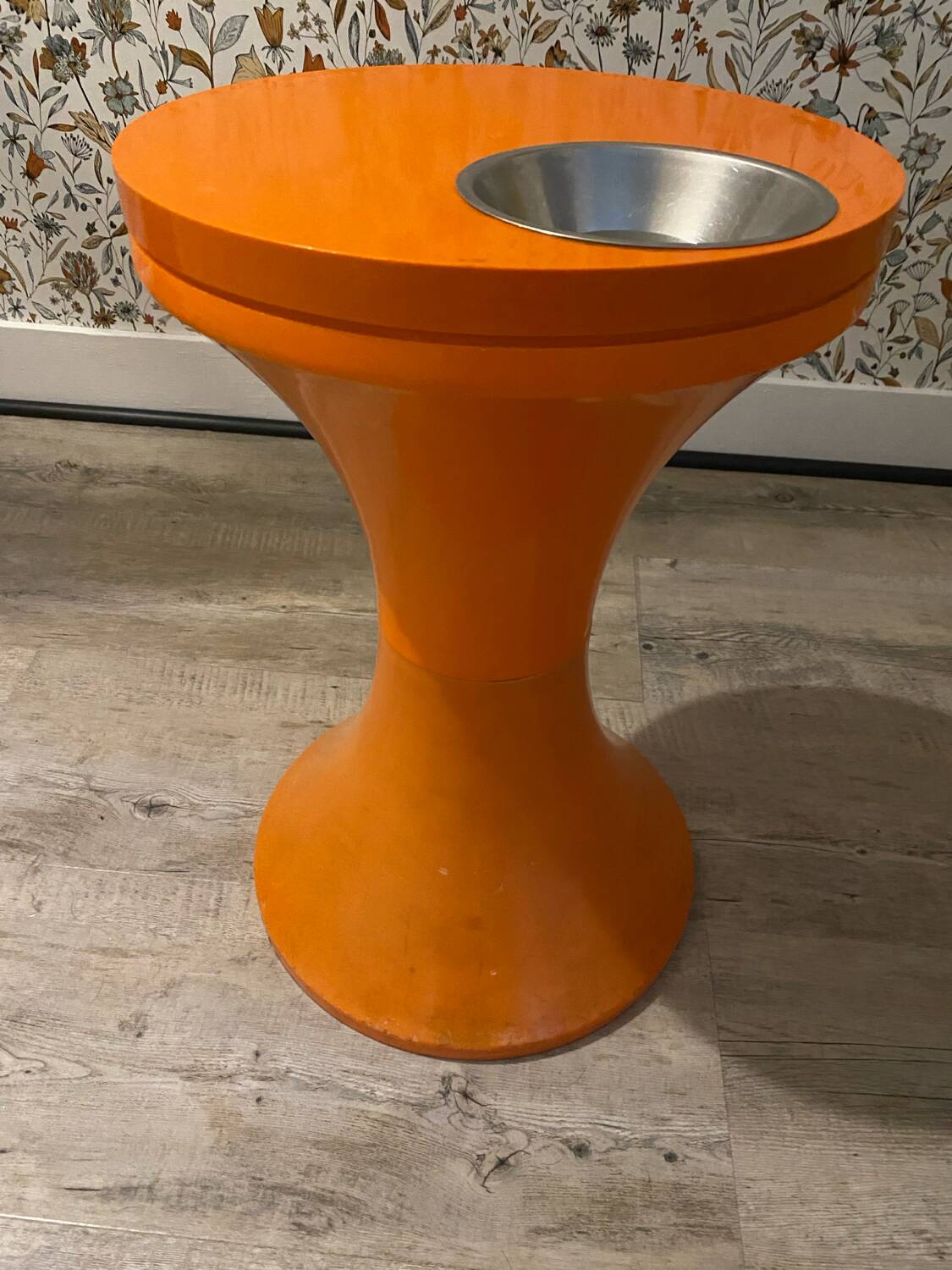 Orange tam-tam by Stamp with integrated pocket.