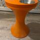 Orange tam-tam by Stamp with integrated pocket.