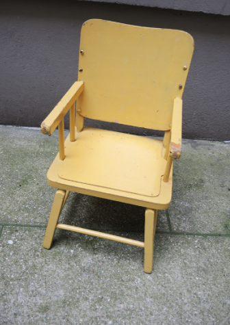 Children's chair in yellow wood