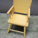 Children's chair in yellow wood