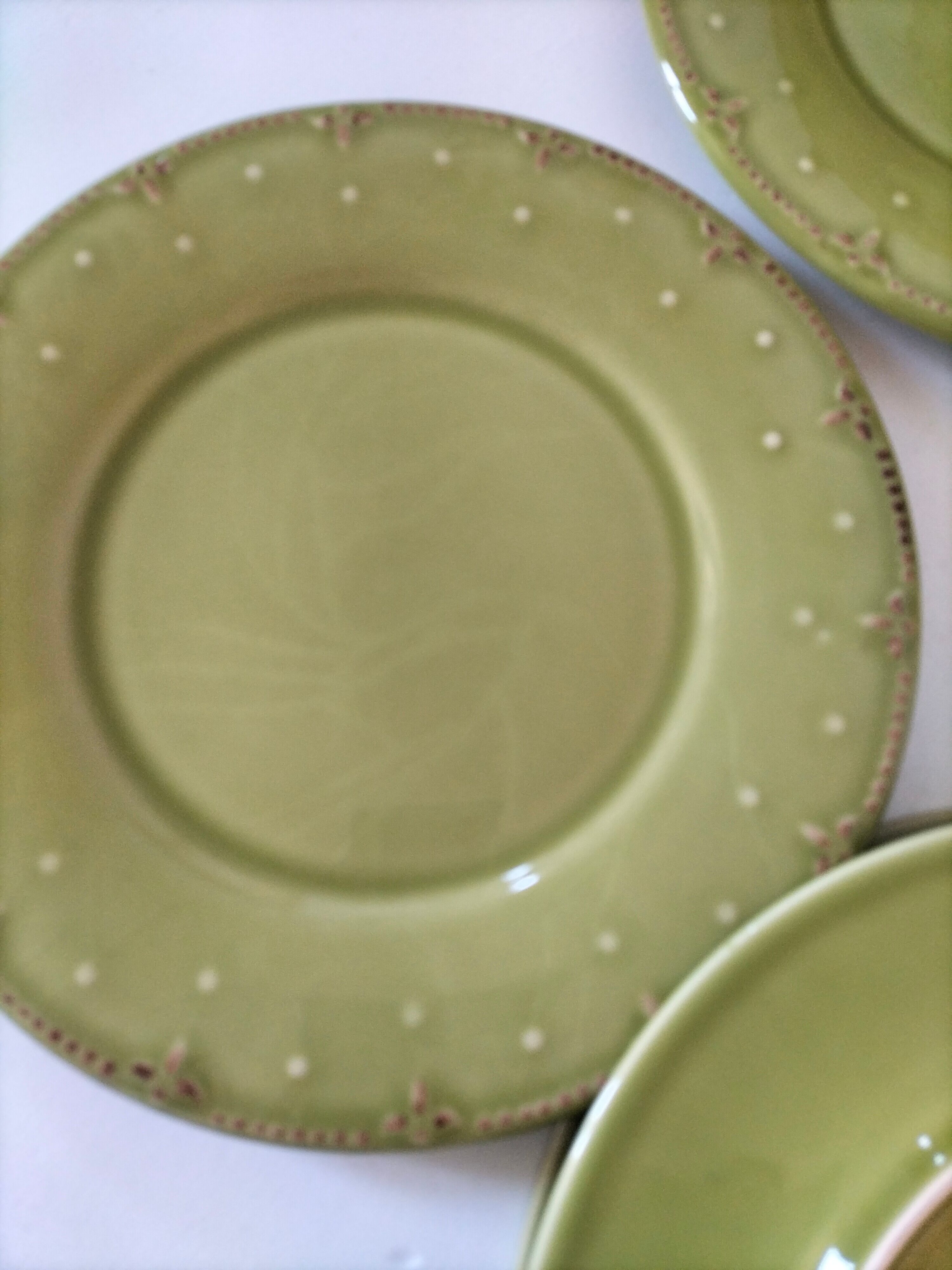 6 olive green plates with dotted relief, workshop ceramic style