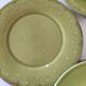 6 olive green plates with dotted relief, workshop ceramic style