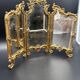Triptych mirror, gilt bronze, circa 1900.