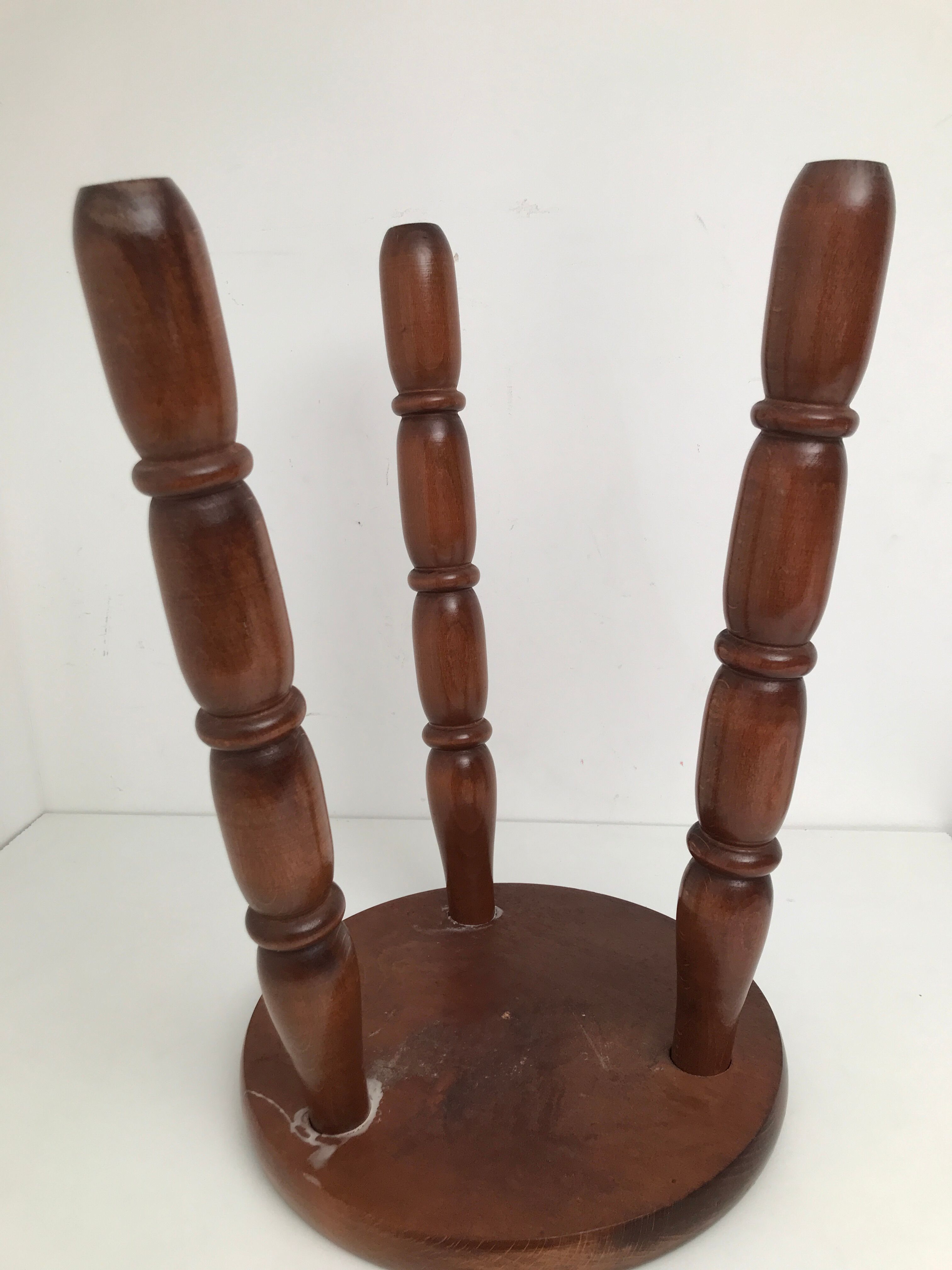 Wooden stool turned tripod foot