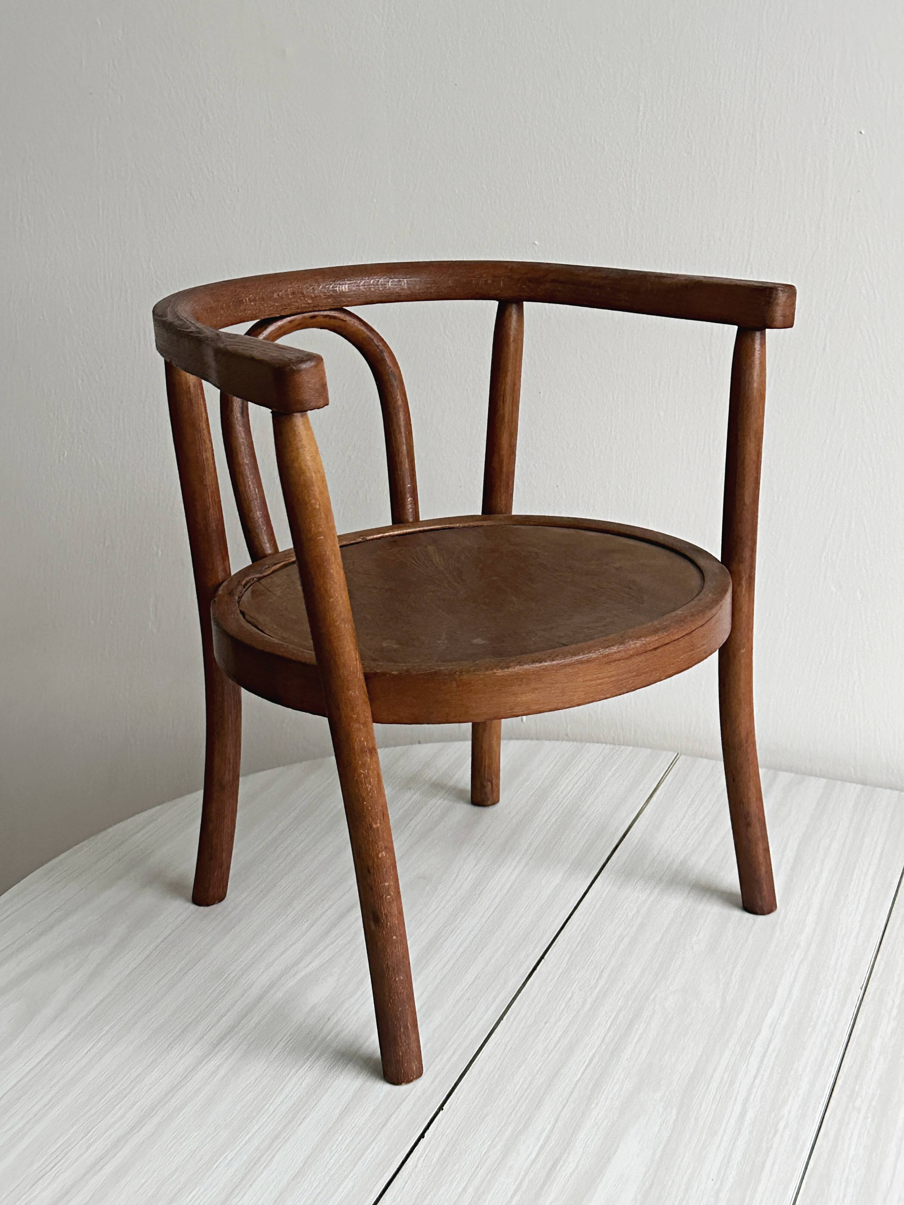 vintage curved wooden children's chair