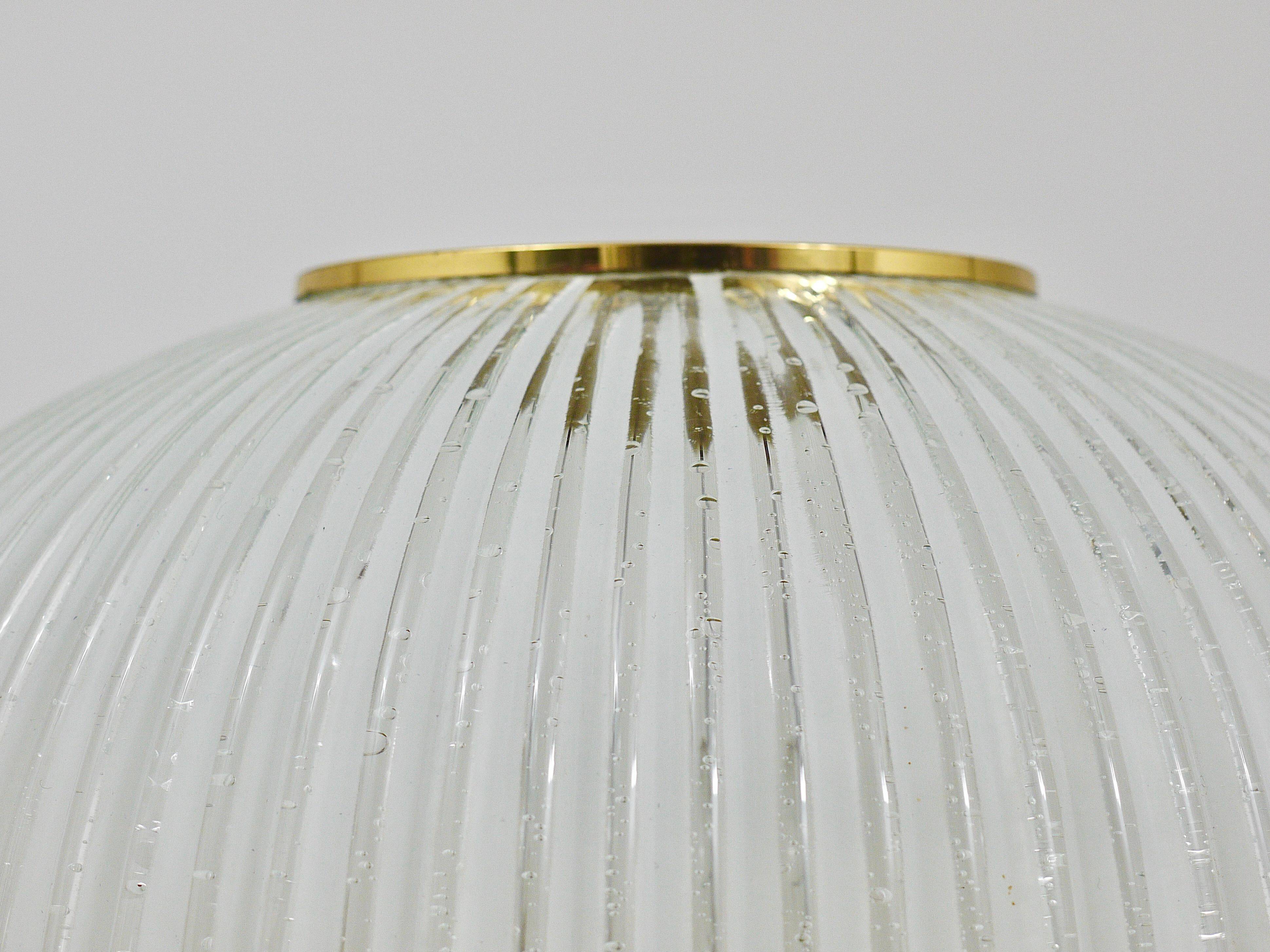 Large striped glass ceiling lamp in brass, Limburg, Germany, 1970s.