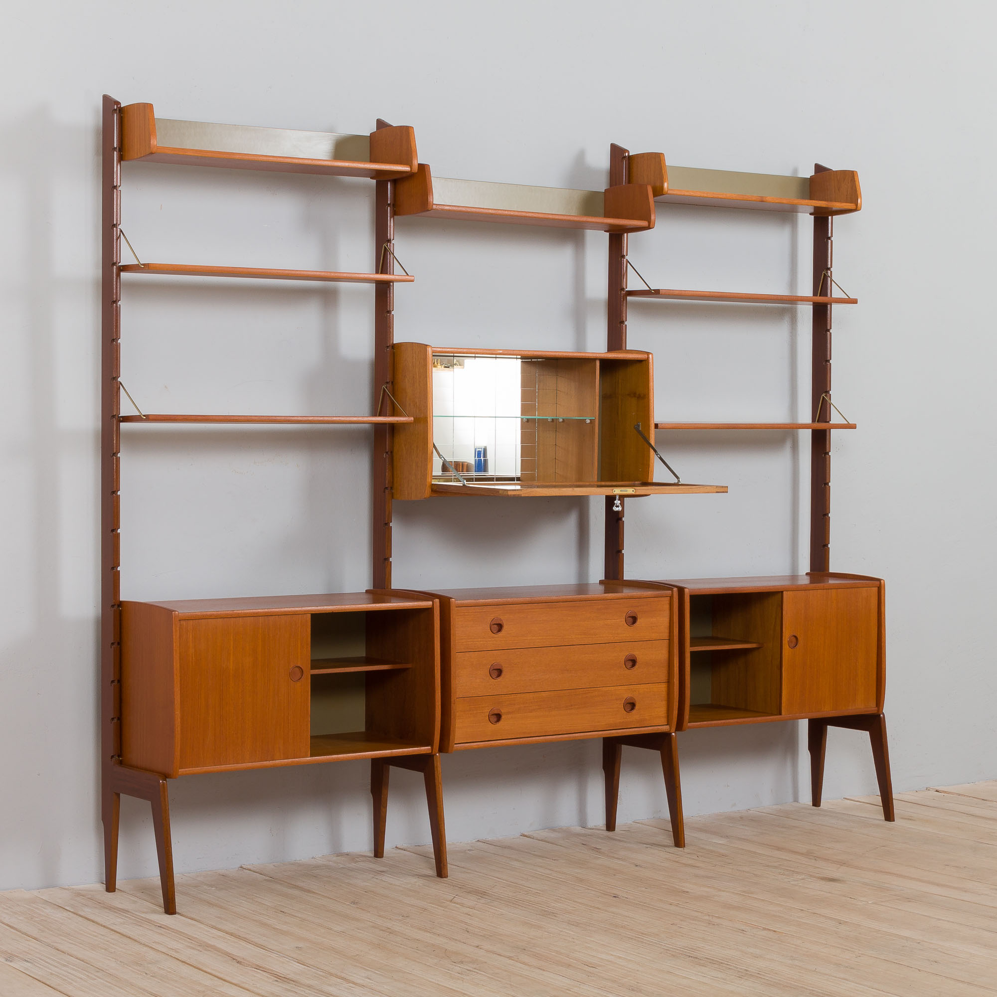 Scandinavian  free standing  Ergo wall unit bar cabinet and 3 cabinets and with 7 shelves,  by John
