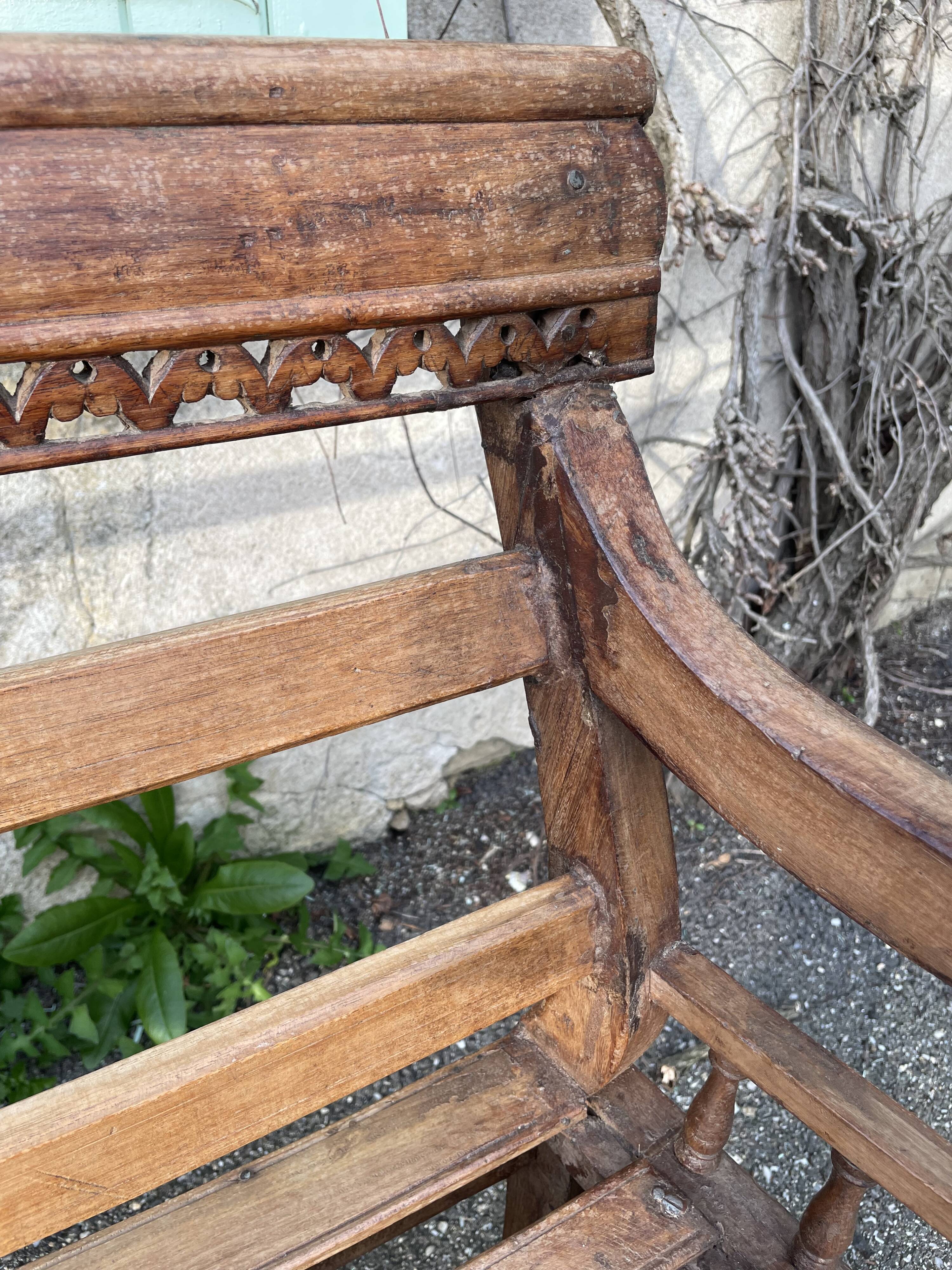 Carved teak bench