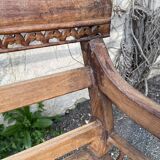 Carved teak bench