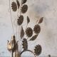 Applique murale fleurs metal doré