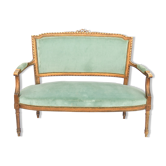 Canapé en bois doré de style Louis XVI