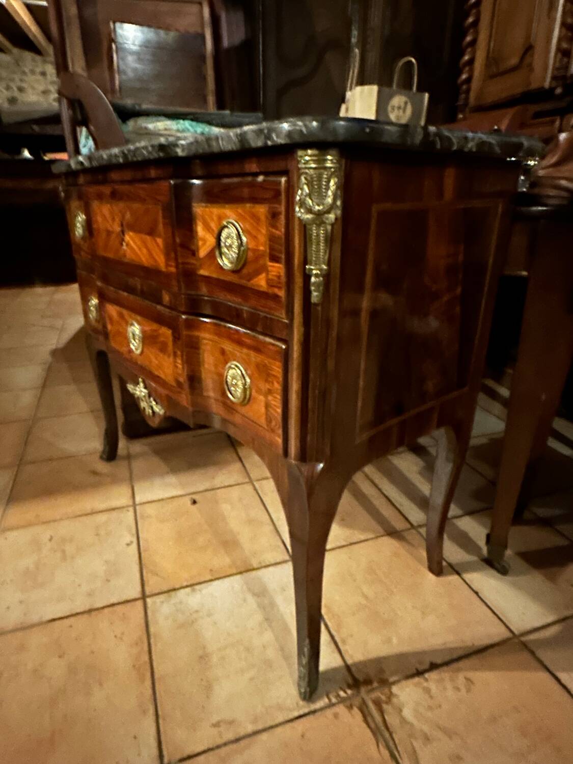 Small Louis XV transitional chest of drawers – precious wood veneer and marble.