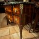 Small Louis XV transitional chest of drawers – precious wood veneer and marble.