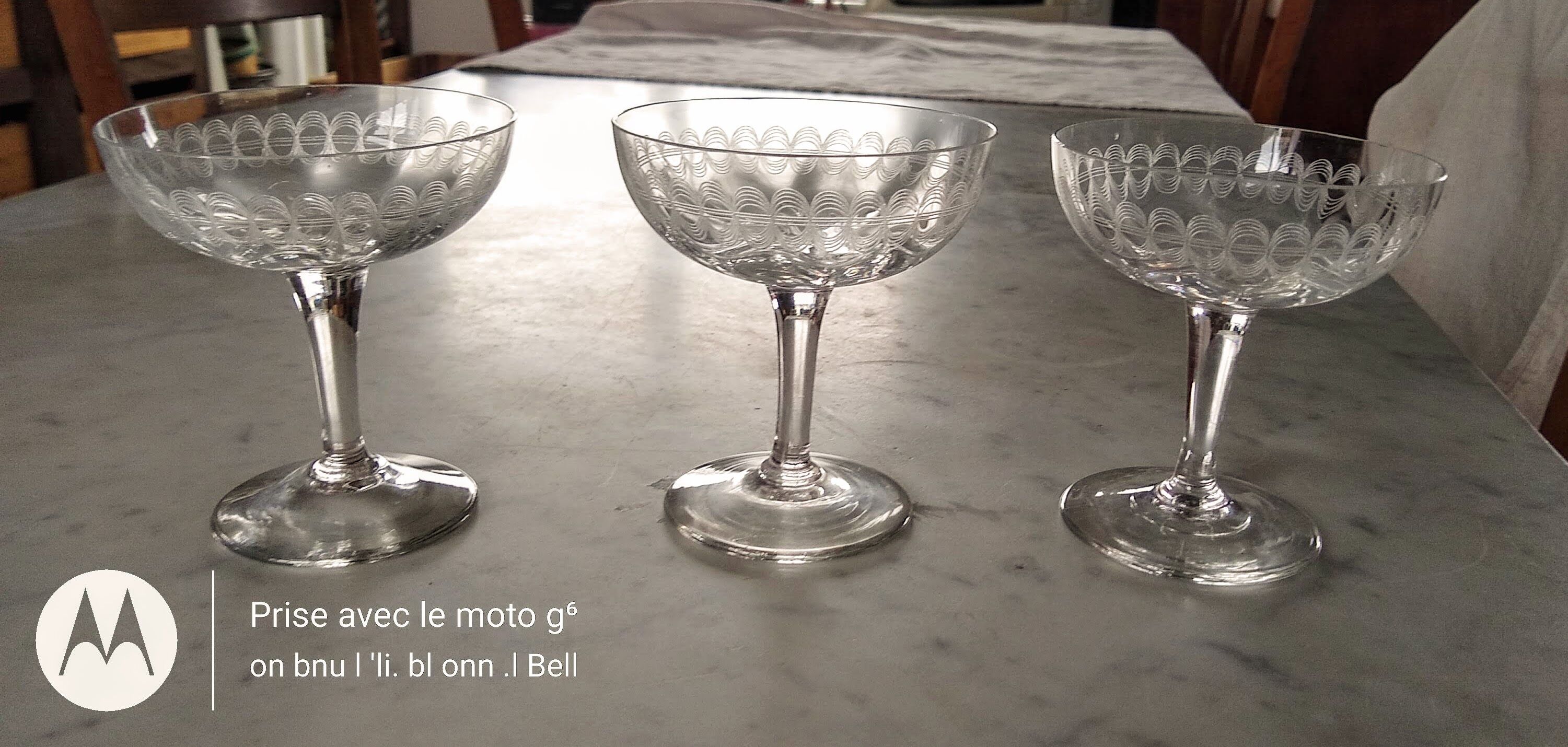3 champagne glasses in cut glass