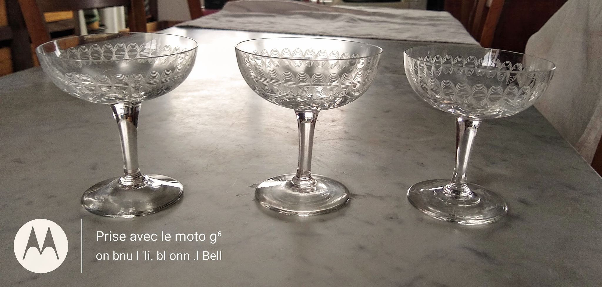 3 champagne glasses in cut glass