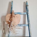 Old ladder in blue wood