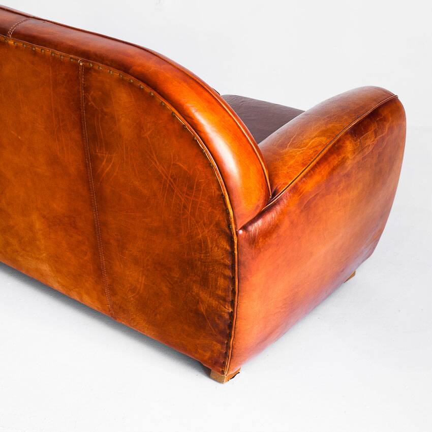 Vintage leather club sofa. Art Deco style. France, 1950s. (sofa convertible into bed)