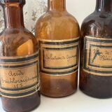 3 amber apothecary bottles