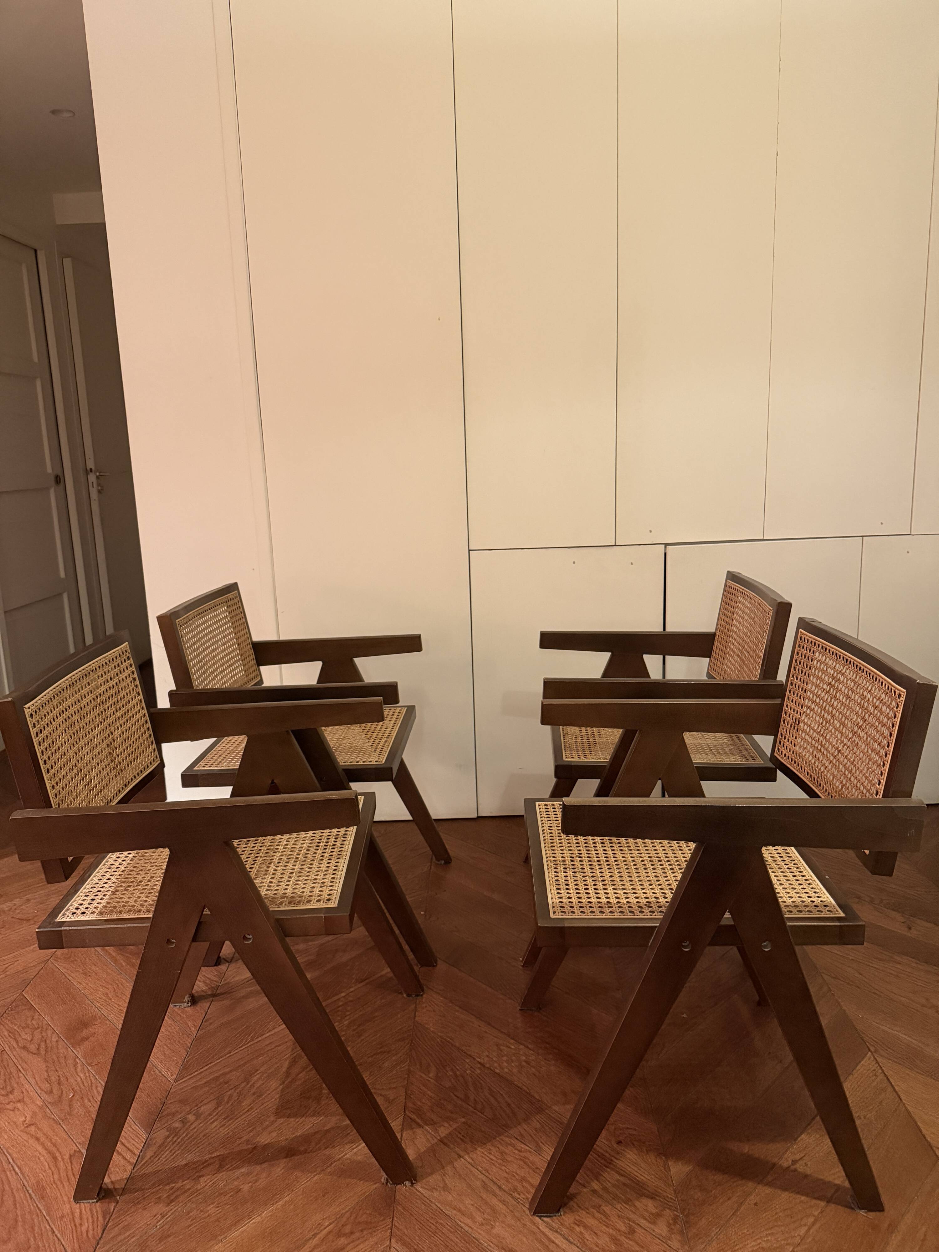 Chairs by Pierre Jeanneret