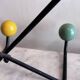 Wall coat rack Roger Feraud, metal and wooden balls.