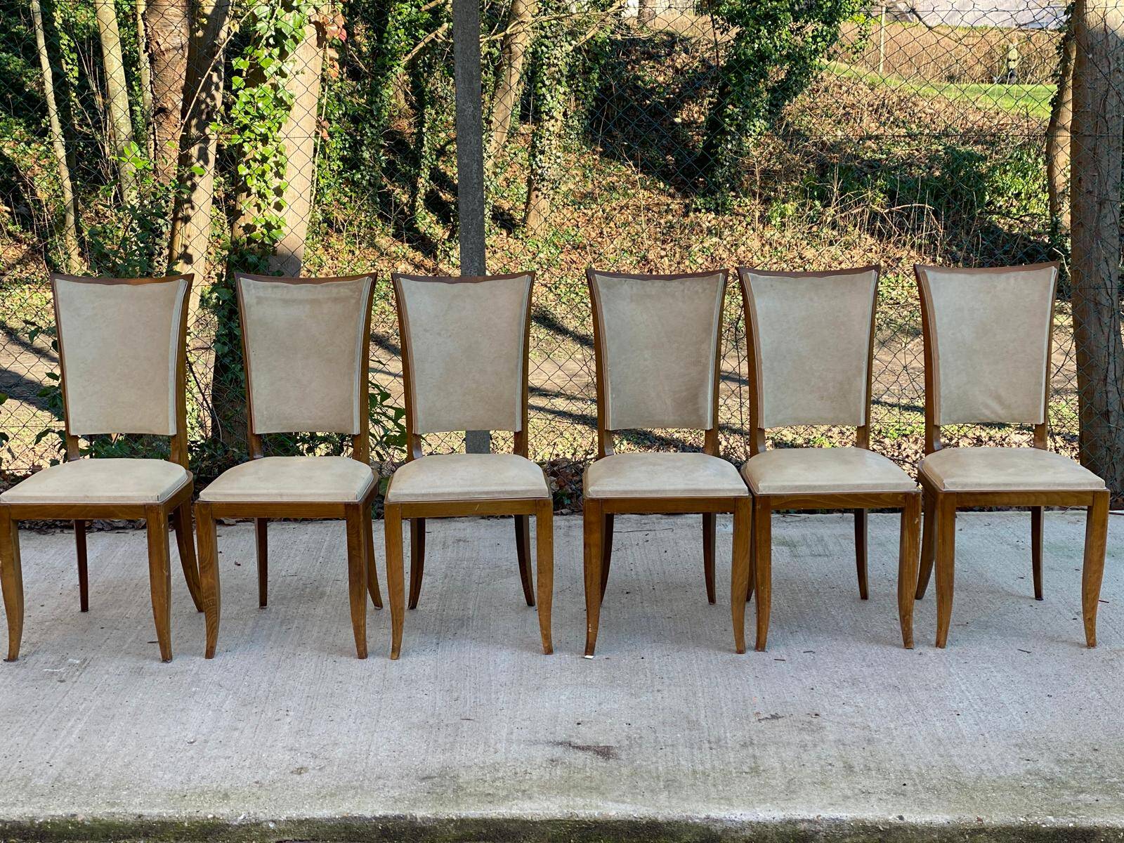 6 Italian Scandinavian style dining chairs from the 1950s in wood and leather.
