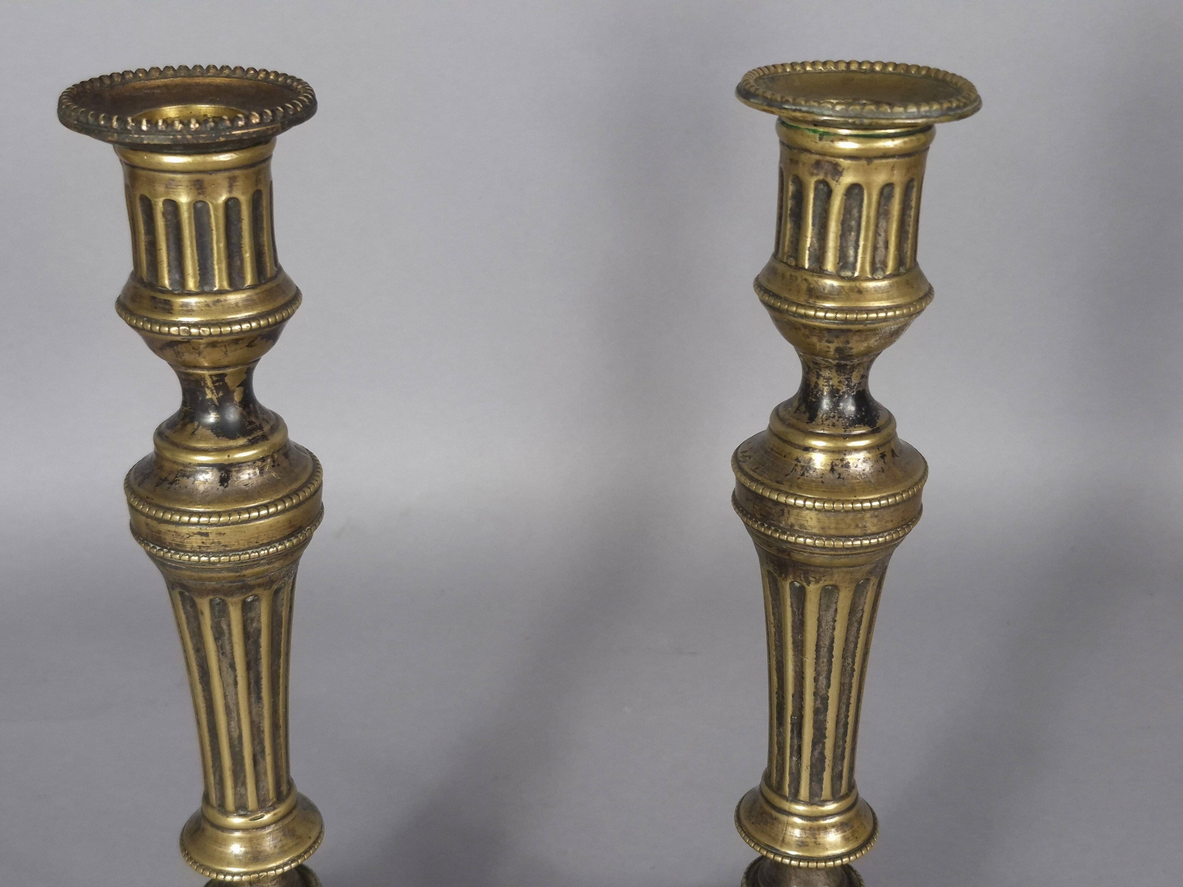 Pair of fluted bronze candlesticks Louis XVI period 27 cm