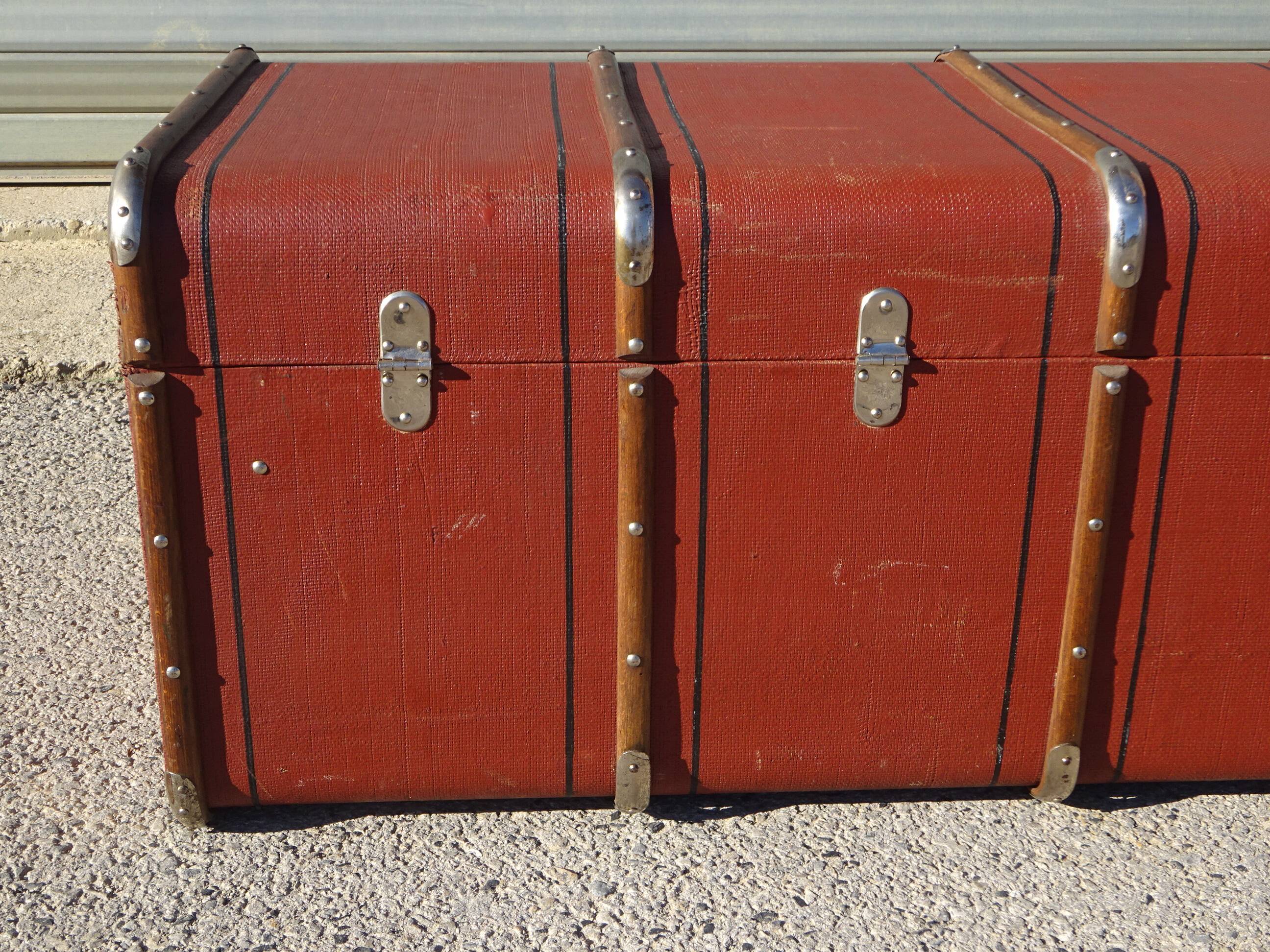 Old curved travel trunk