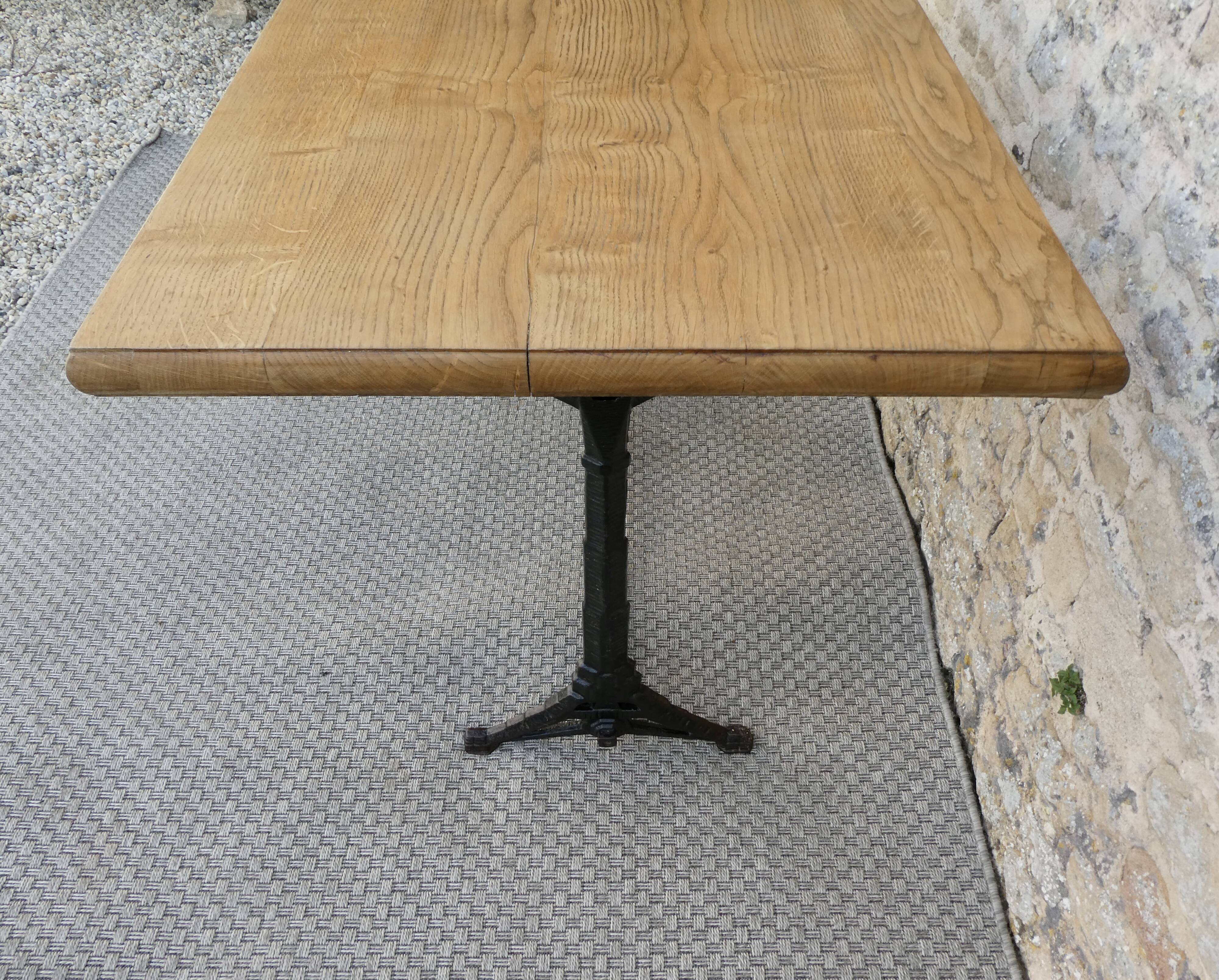 bistro table with cast iron legs signed Lelong, early 20th century