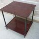 Wooden vintage table on wheels