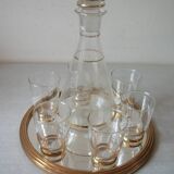 Old glass carafe liquor service with gilding vintage ice mirror tray