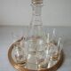Old glass carafe liquor service with gilding vintage ice mirror tray